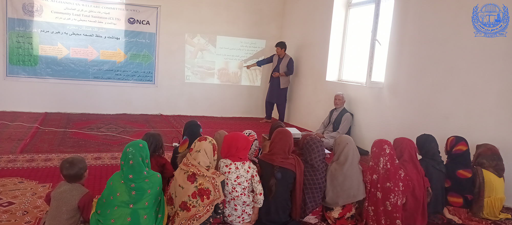 CAWC staff conducting CLTS awareness session in Samangan province