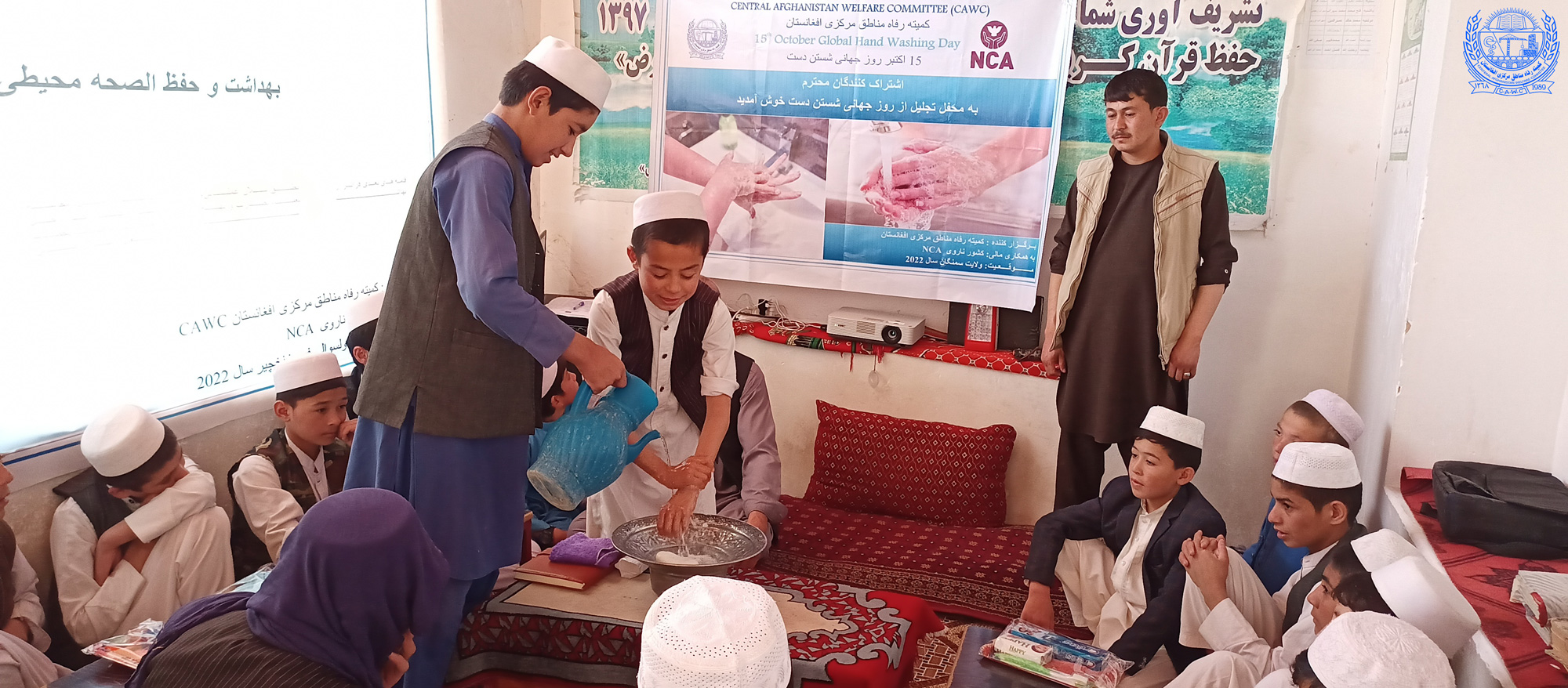 CAWC staff conducting CLTS awareness session in Samangan province